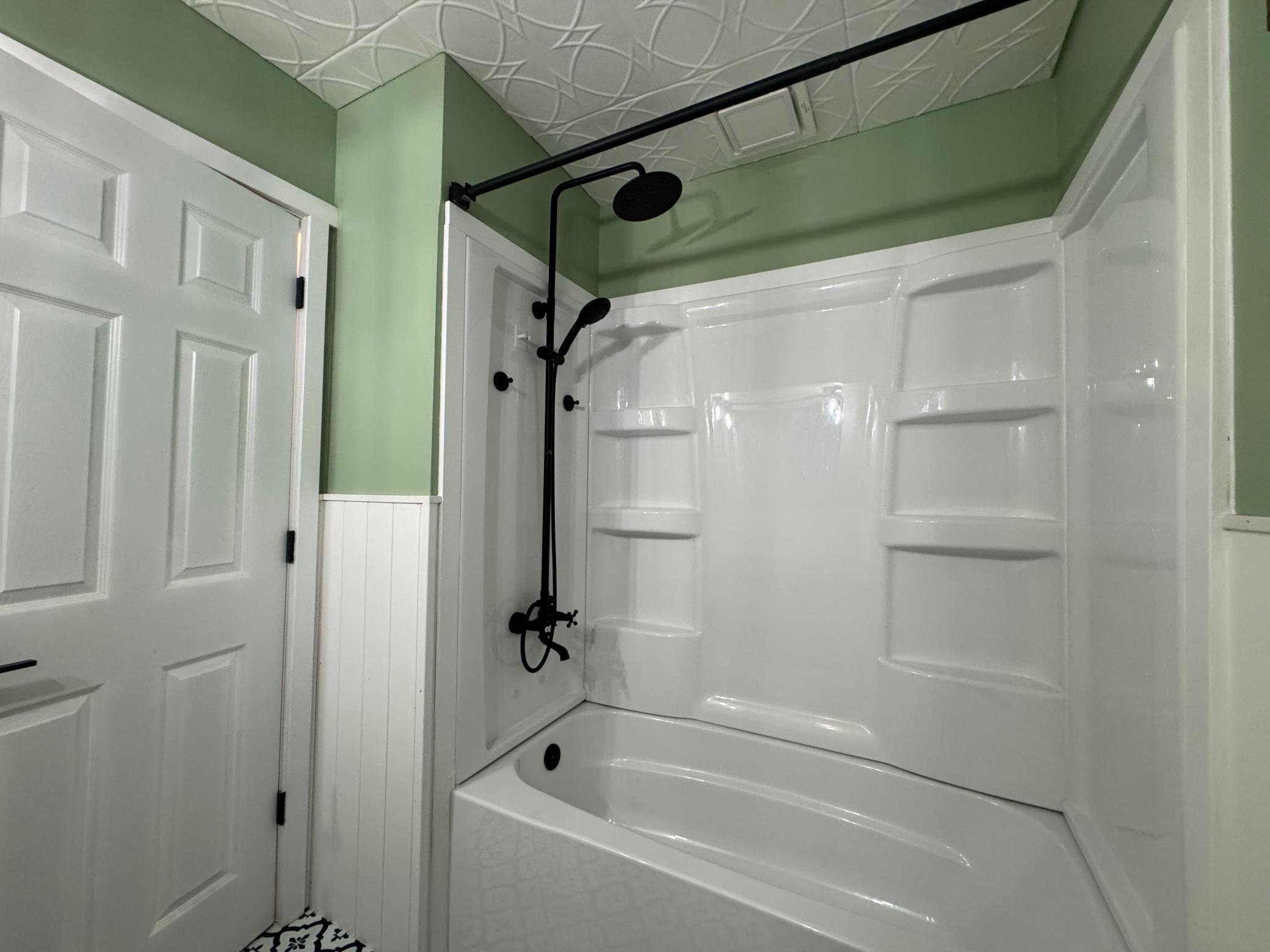 Main floor full bath with tub