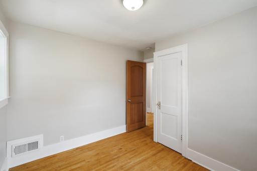 Bedroom 2 with hardwood floors