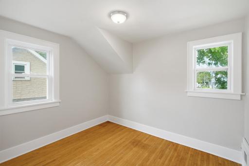 Bedroom 2 with hardwood floors
