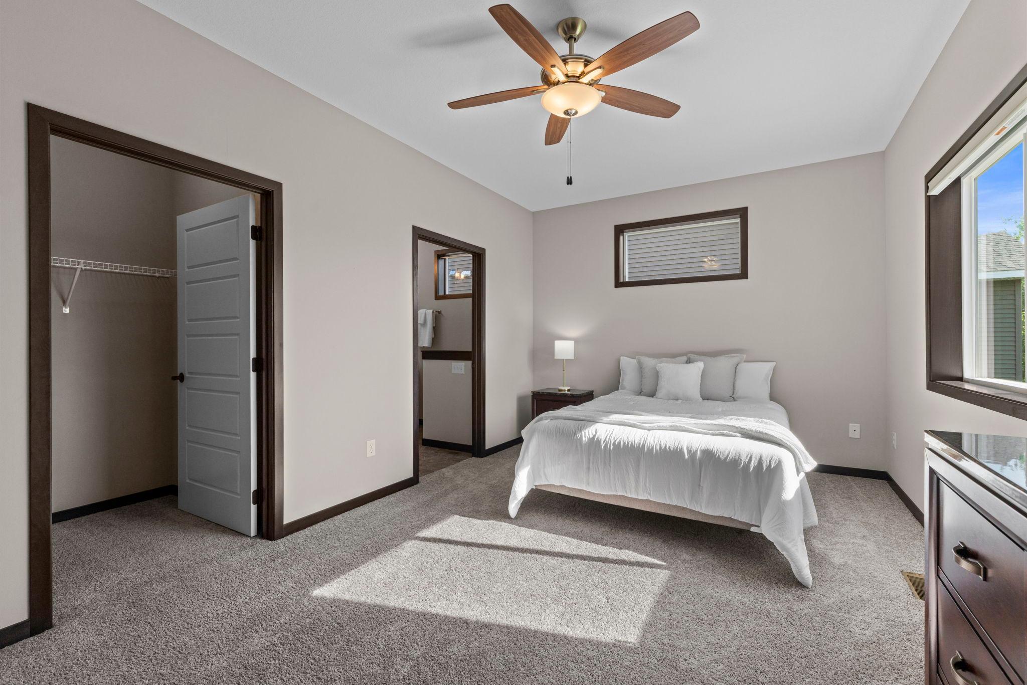 Lovely primary bedroom with walk-in closet and en suite bath