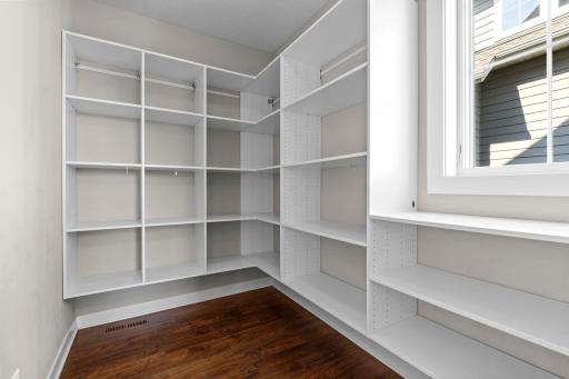 Walk in pantry with upgraded shelving