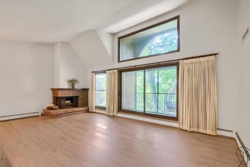 Coveted 3rd floor location with vaulted ceilings and abundant windows to fill the space with natural light. Brand new flooring installed throughout home.
