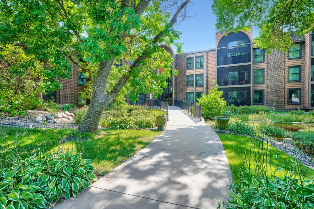 Welcome to 9600 Portland Ave S #317 - lovely grounds, welcoming entry into this 3 story condo building in prime Bloomington location.