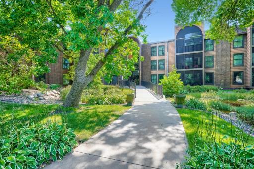 Welcome to 9600 Portland Ave S #317 - lovely grounds, welcoming entry into this 3 story condo building in prime Bloomington location.