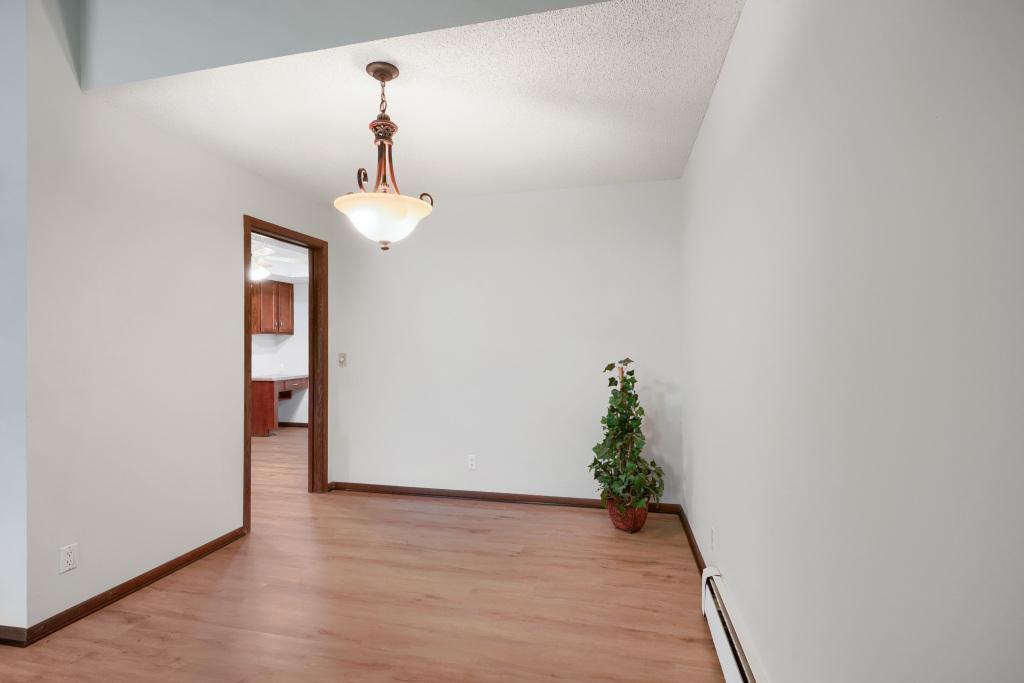 Dining room leads into nice sized kitchen. Home is freshly painted with new flooring.