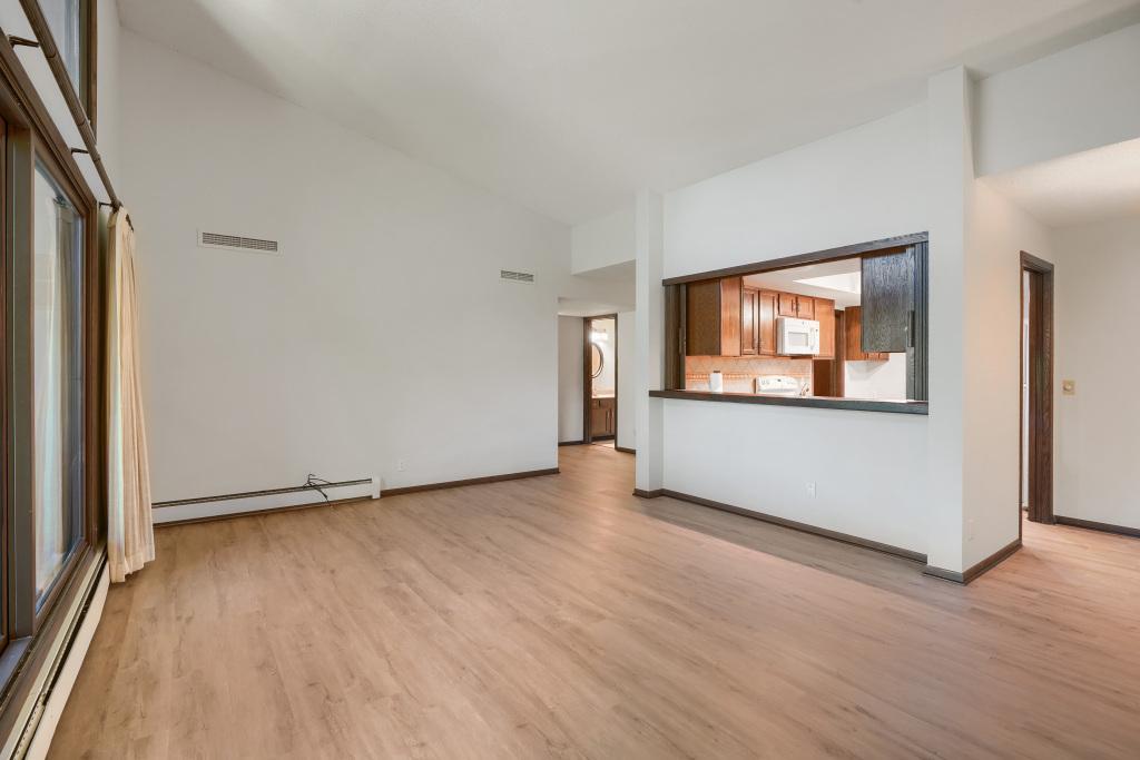 Spacious living area with easy kitchen access