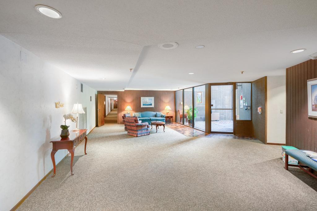 Welcoming entry to 9600 Portland. Secured building, separate mail room and easy access to the elevator.