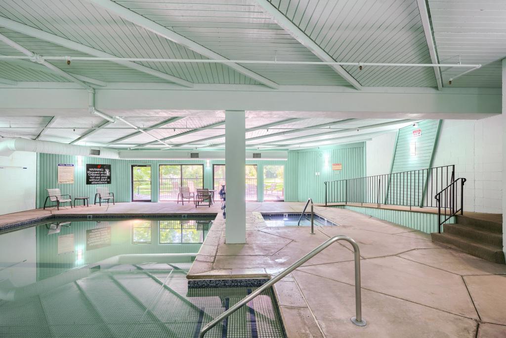 Vacation at home with indoor and outdoor pools, hot tub, sauna, tennis courts & exercise area. Grab a good book or a beverage and relax outside on the private patio area with chairs & BBQ grills.