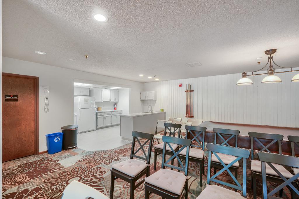 Community room has a full kitchen, access to a guest suite for overnight guests and a patio for outdoor use. A fantastic feature of the building.
