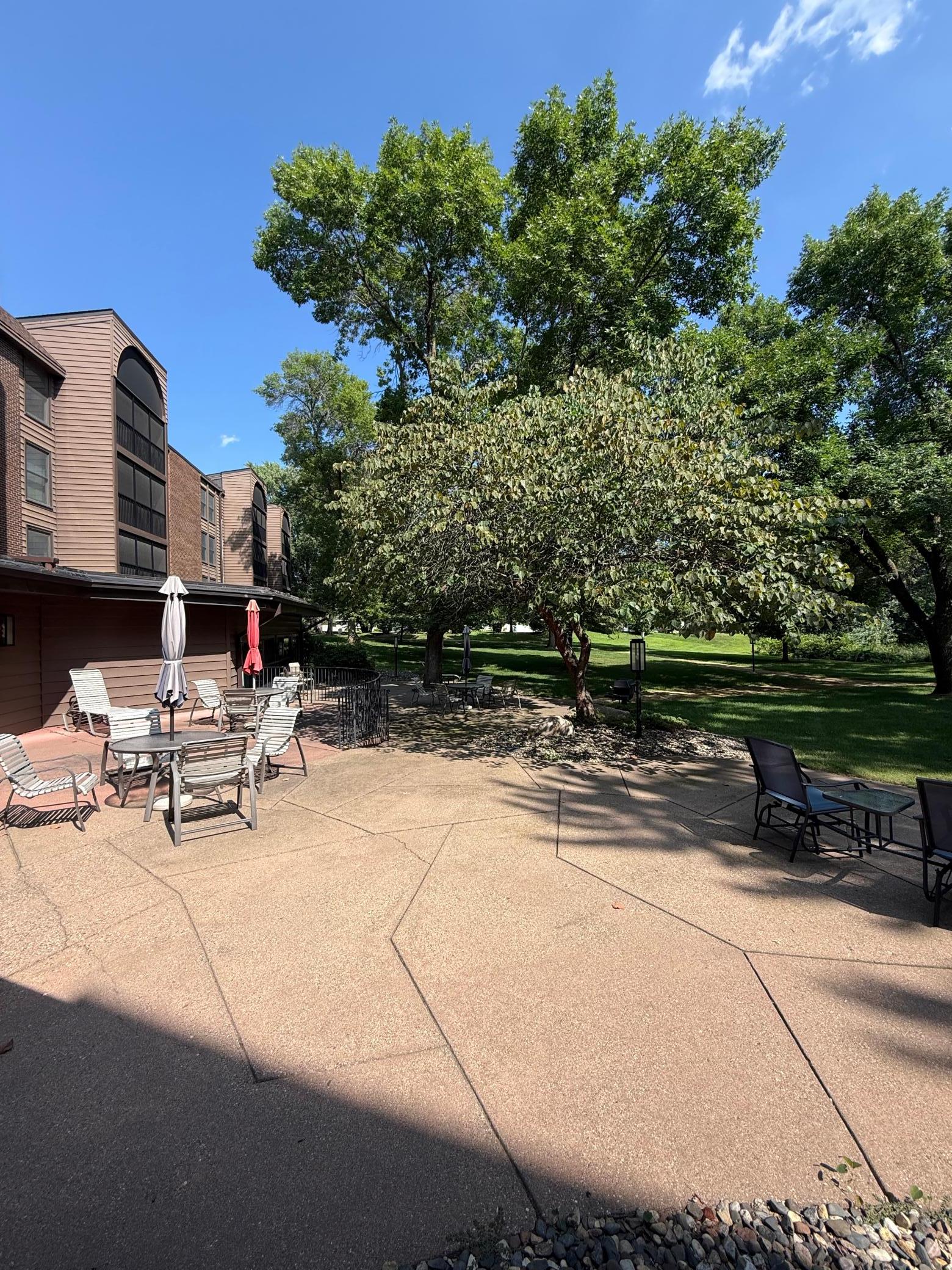 Lovely shared patio space with tables to enjoy