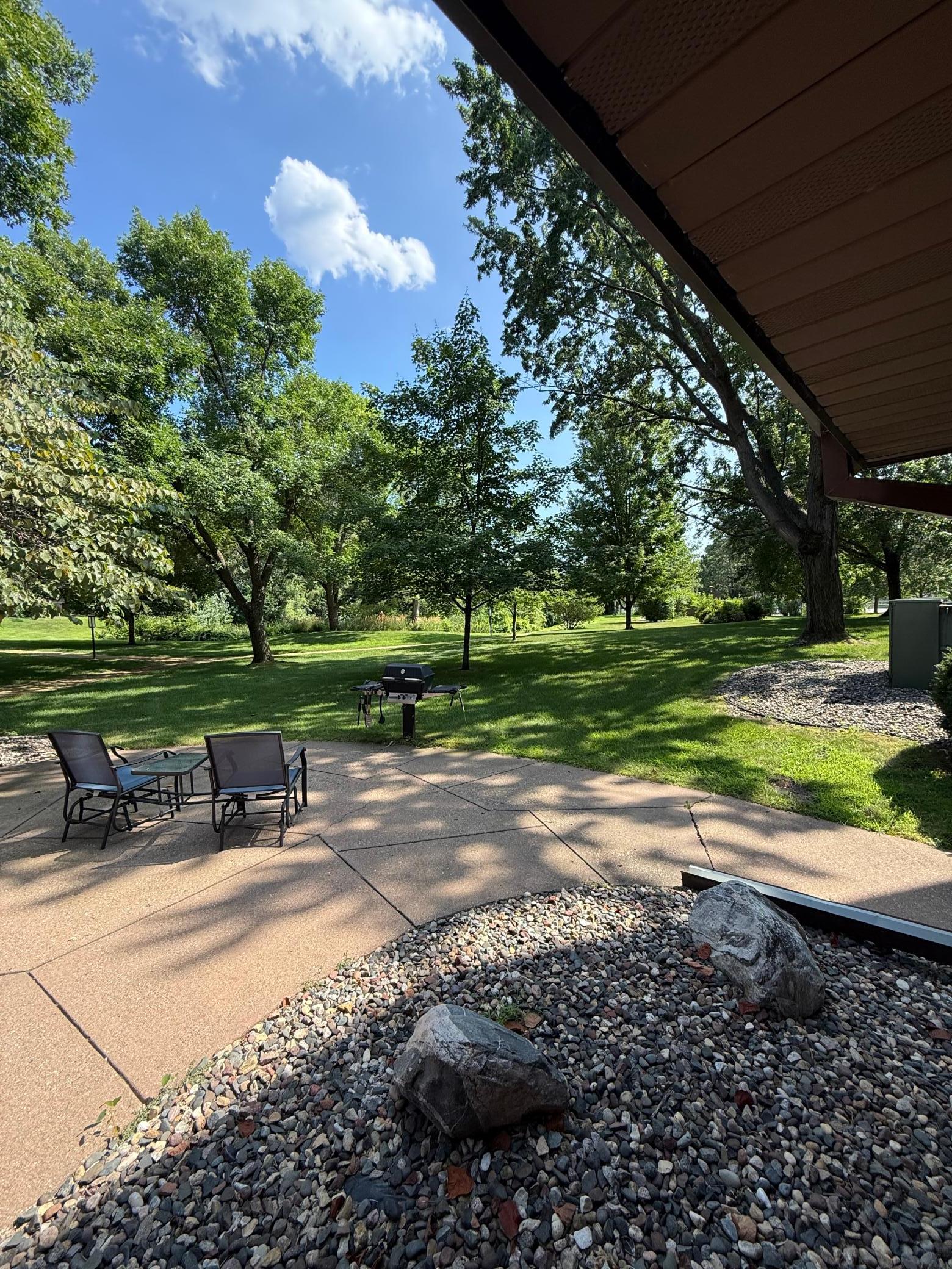 The grounds are beautiful at the complex! Imagine a beautiful sunny day, glass of lemonade and a great book out on this nice patio!