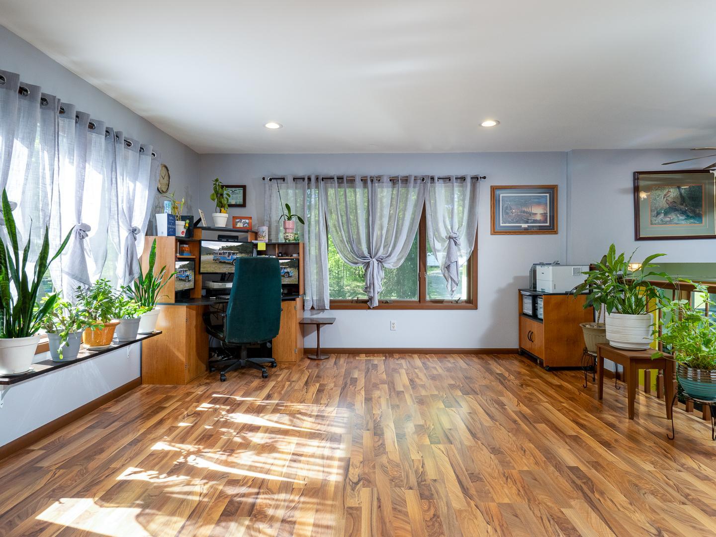 Windows on three sides of the room.