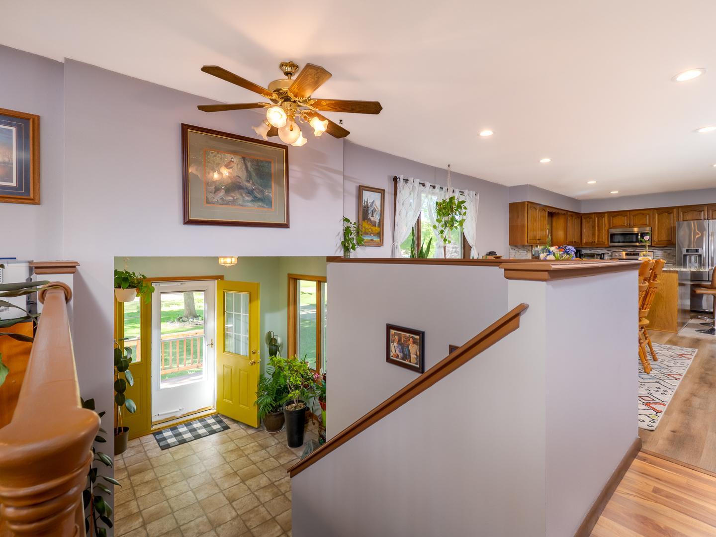 Looking down from the main level to the foyer.