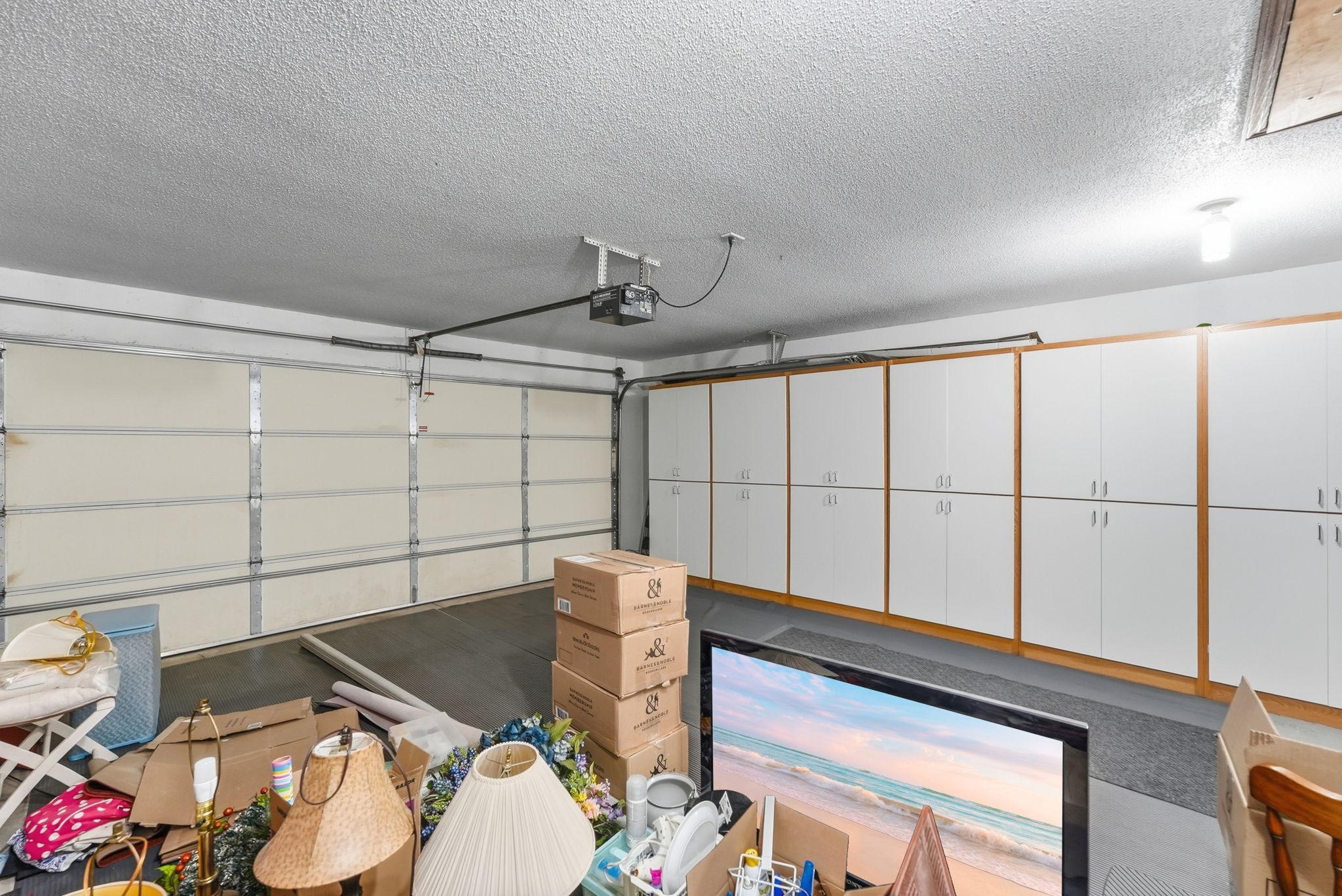 Garage with storage space helps keep everything organized and within reach.