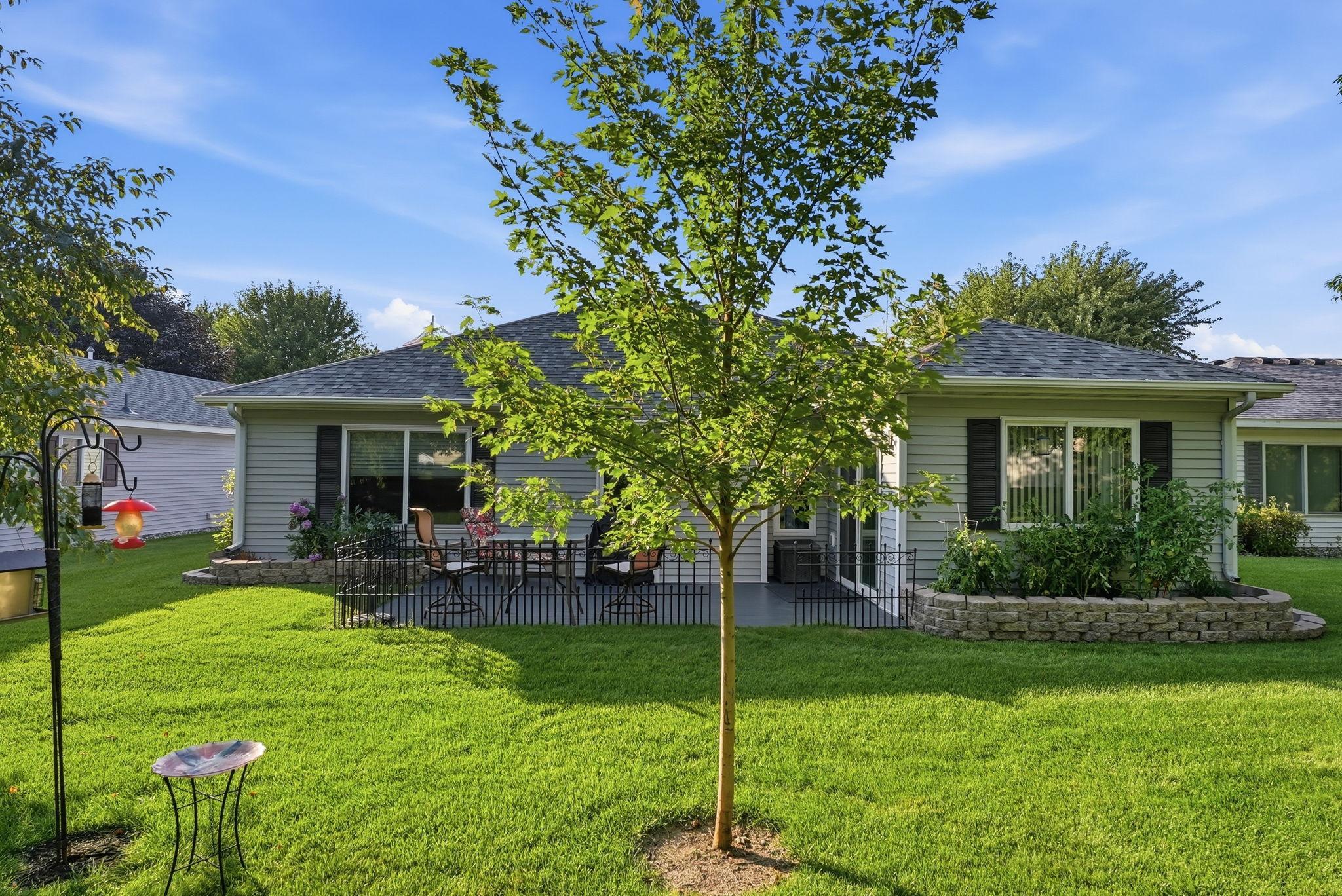 A comfortable outdoor retreat ready for morning coffee, grilling, or evening gatherings.