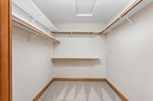 Upper level primary bedroom walk-in closet