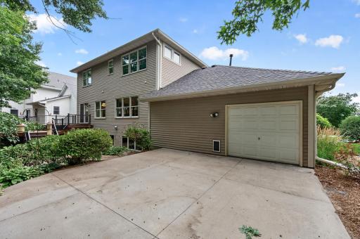 Concrete slab and extra garage door and the back of the home