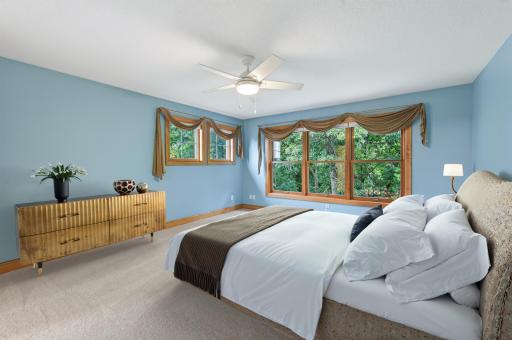 Upper level primary bedroom - virtually staged