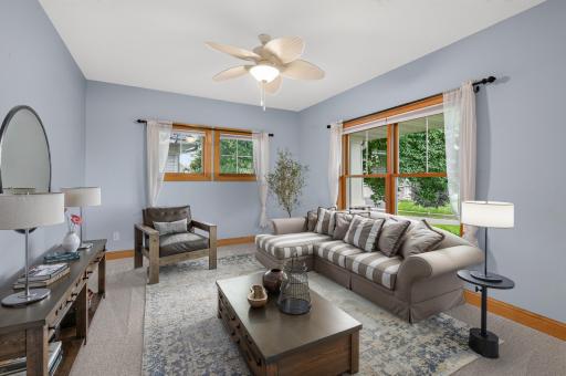 Main level formal dining room/sitting room - virtually staged