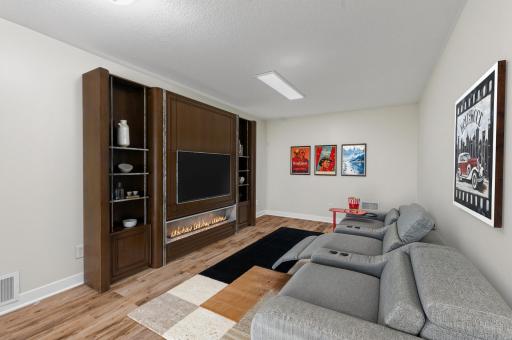 Lower level rec room - virtually staged