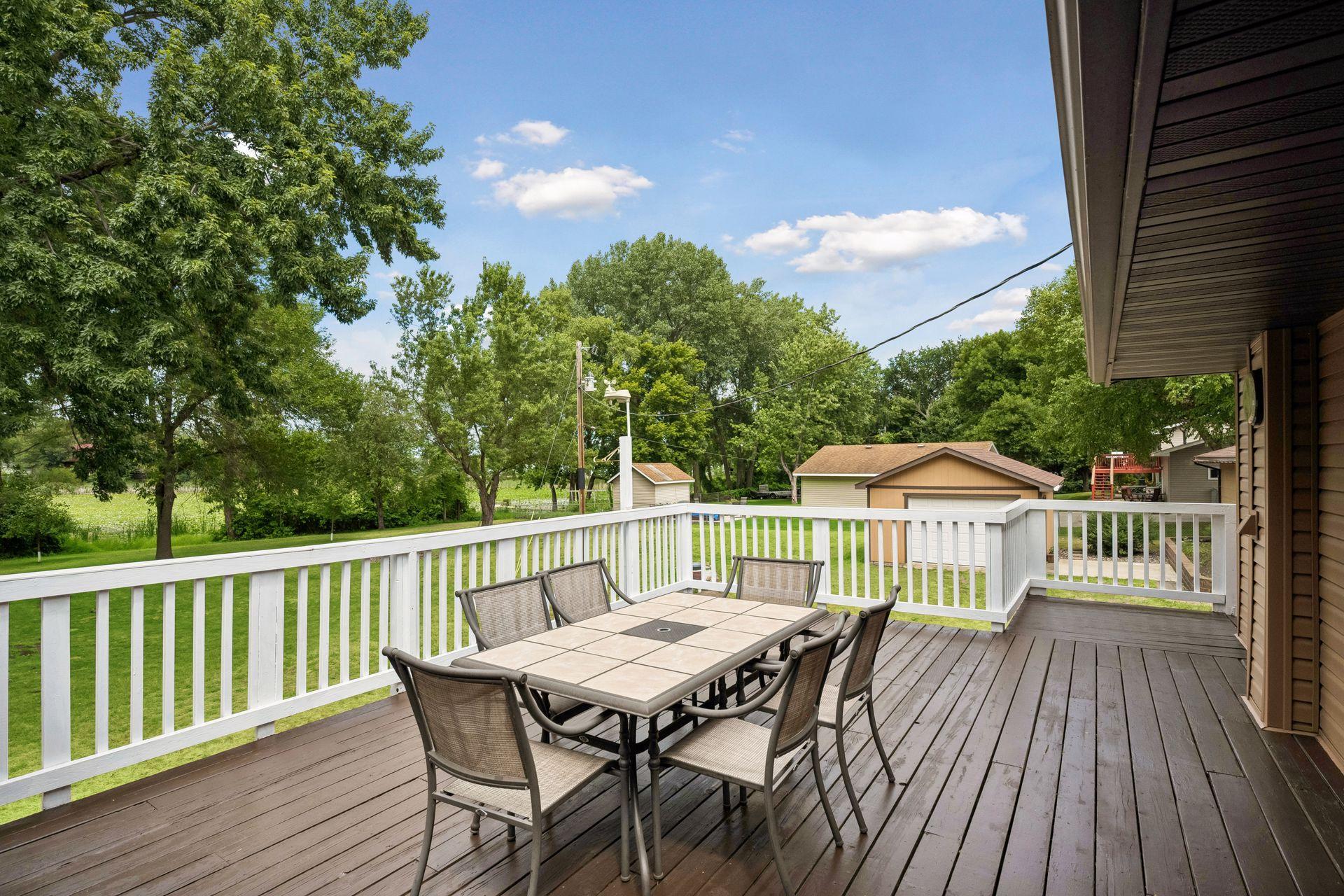The deck looks over the private backyard