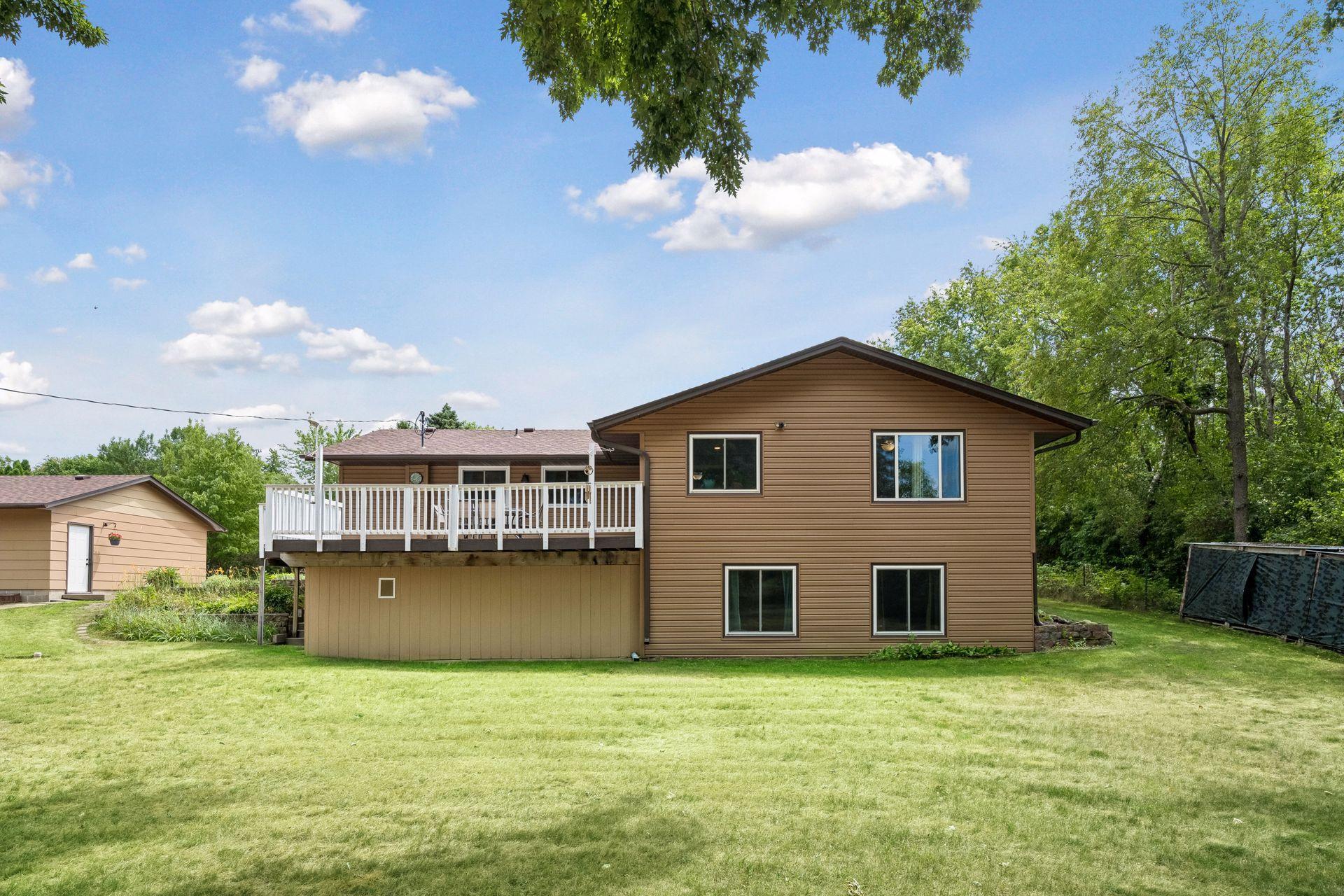 Rear view of home and deck
