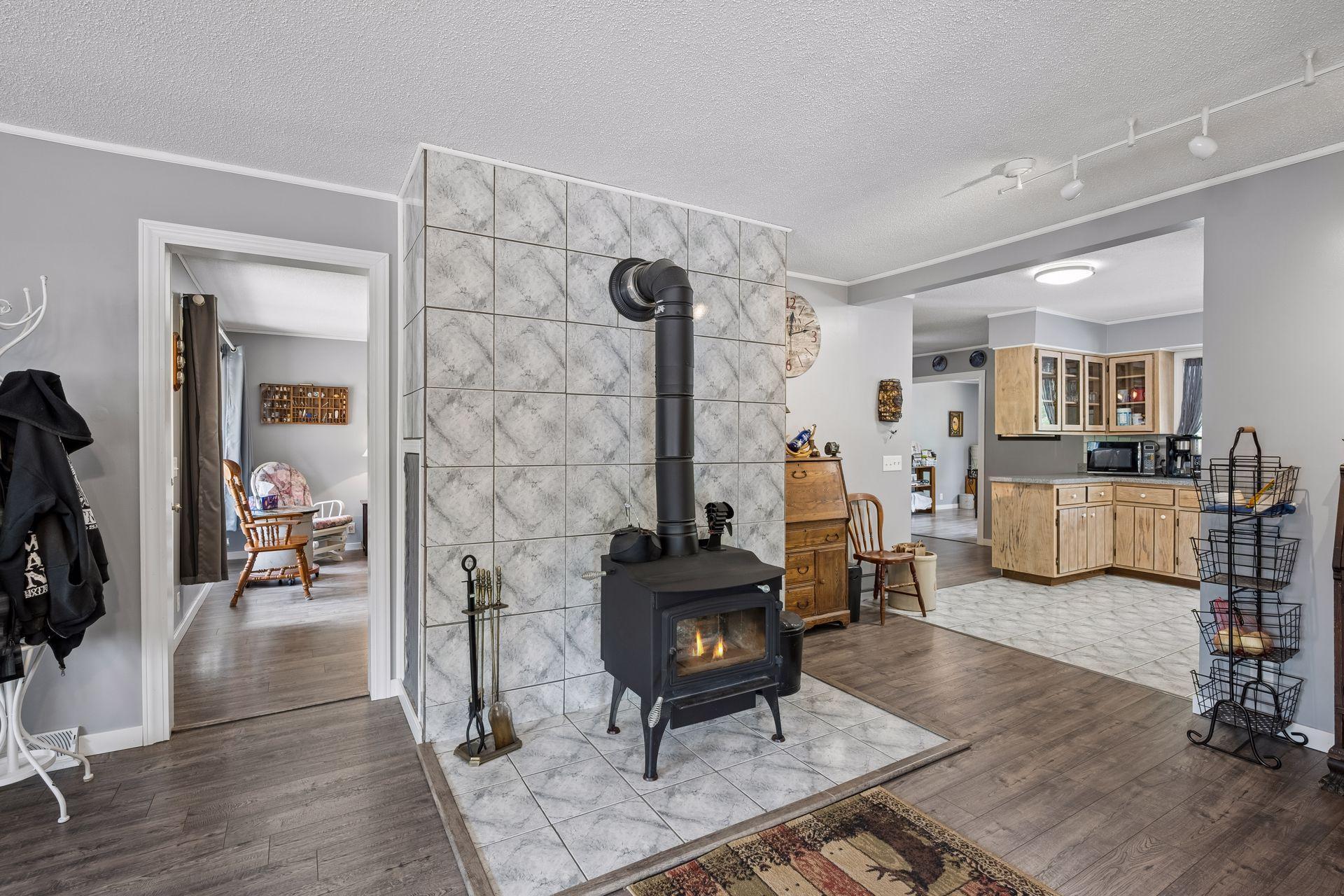 Wonderful wood burning stove is super cozy in the winter months.