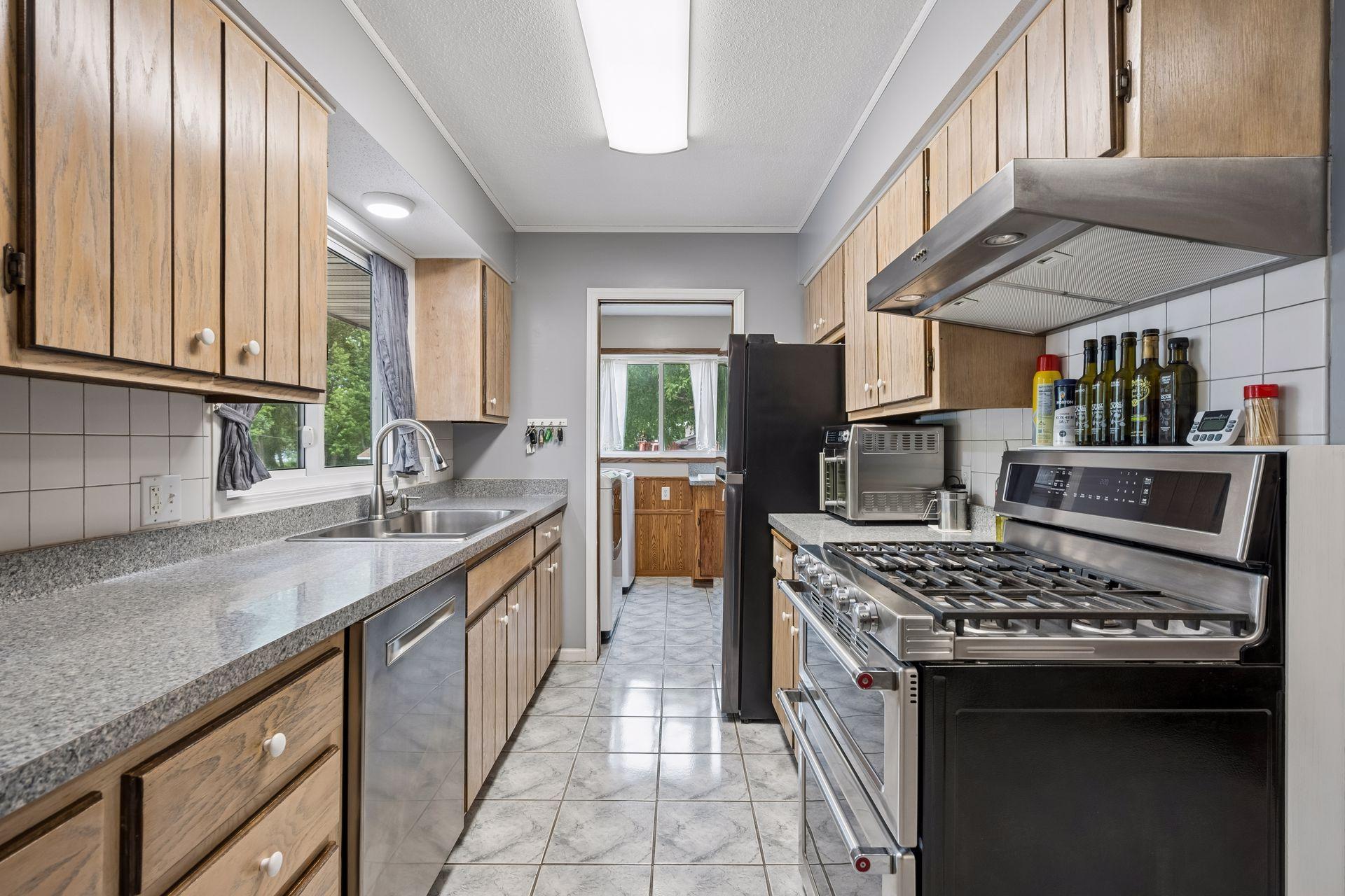 View looking into the laundry room which has a pocket door.