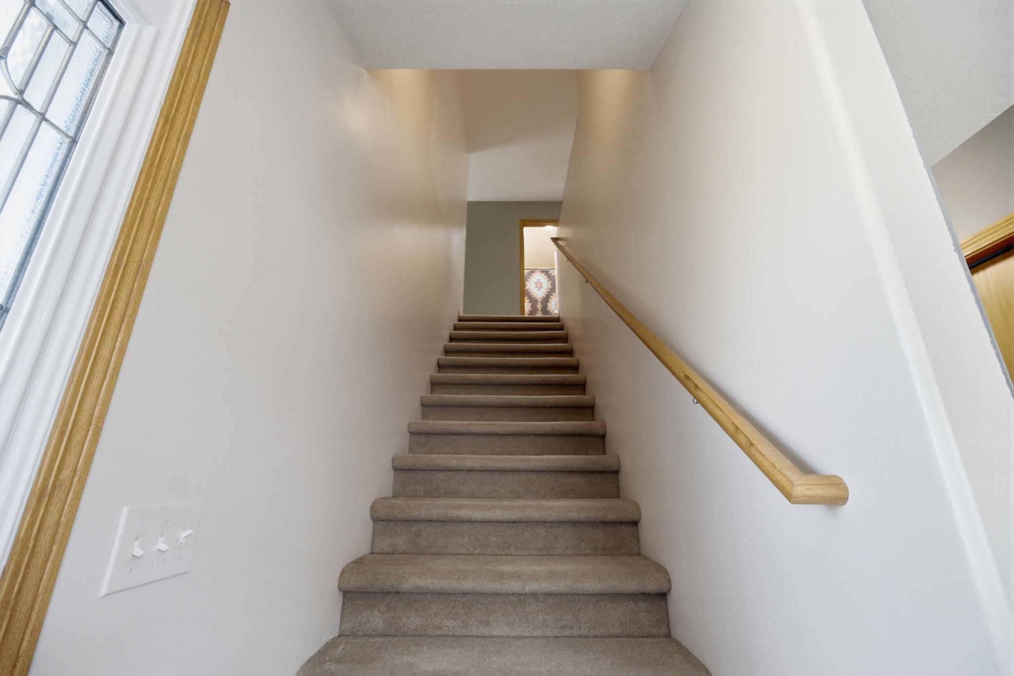 Staircase to Second level at front entry