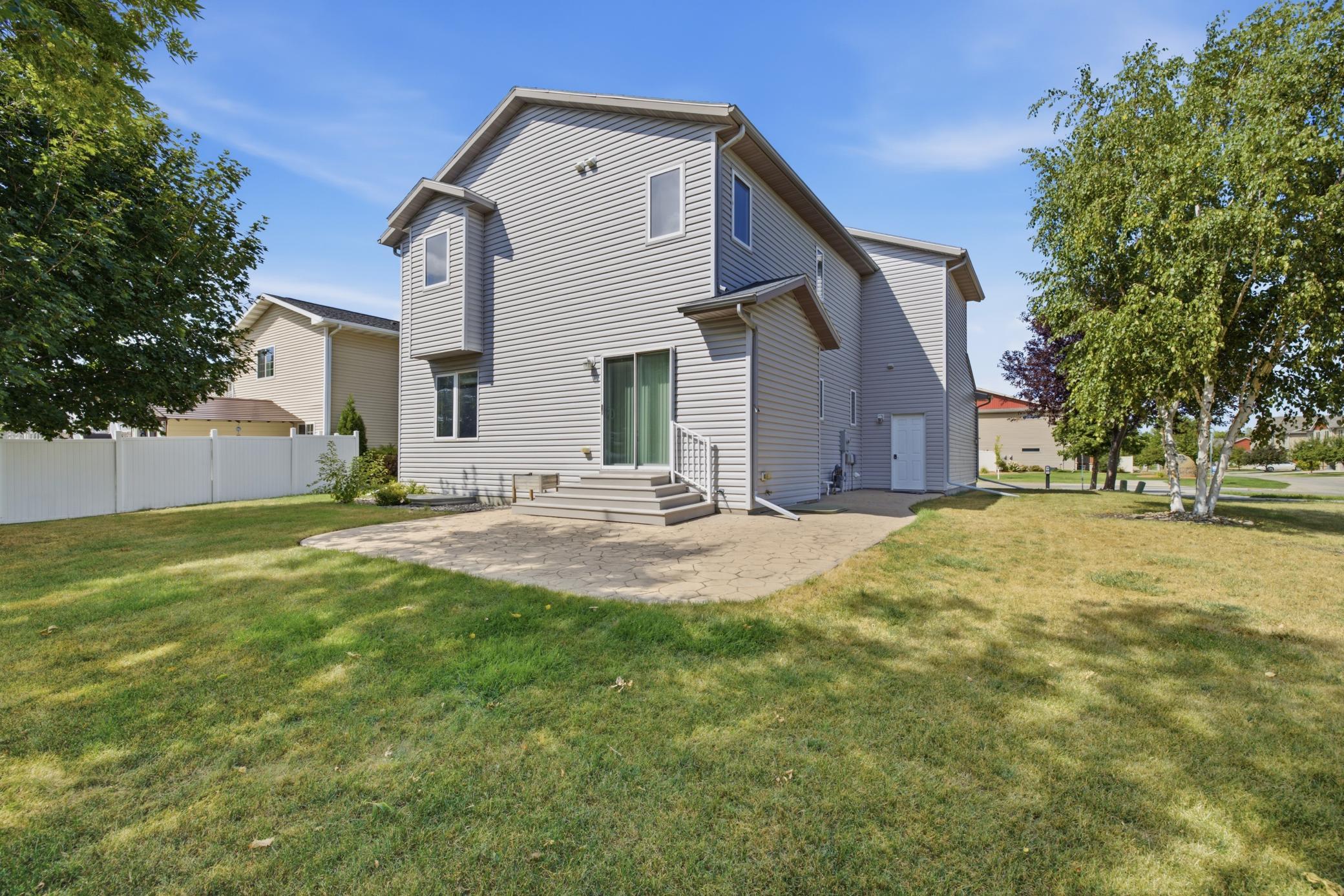 Back of House w/ concrete stamped patio