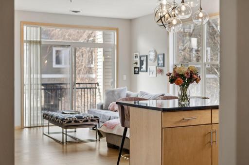 Open sightlines into the bright living area with access to the private balcony.