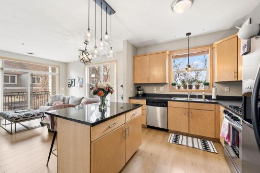 Functional kitchen layout with abundant storage, stainless appliances, and great natural light.