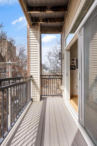 Private balcony with elevated views and space to enjoy fresh air and sunshine.