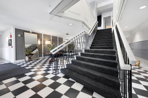 Beautifully updated lobby with grand staircase, secure entry, and welcoming common spaces.