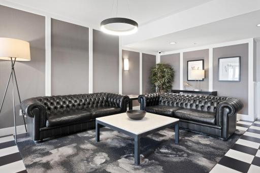 Elegant lobby lounge with comfortable seating and a polished, upscale feel.