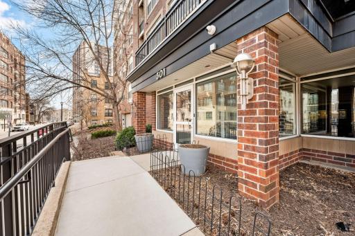 Welcoming front entrance with secure access and a convenient city location.