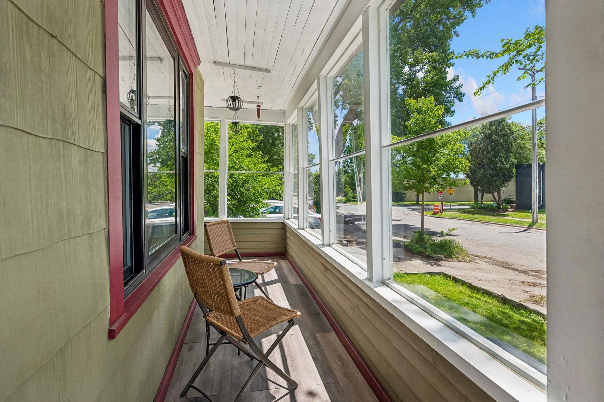 Cute and charming south facing front porch.