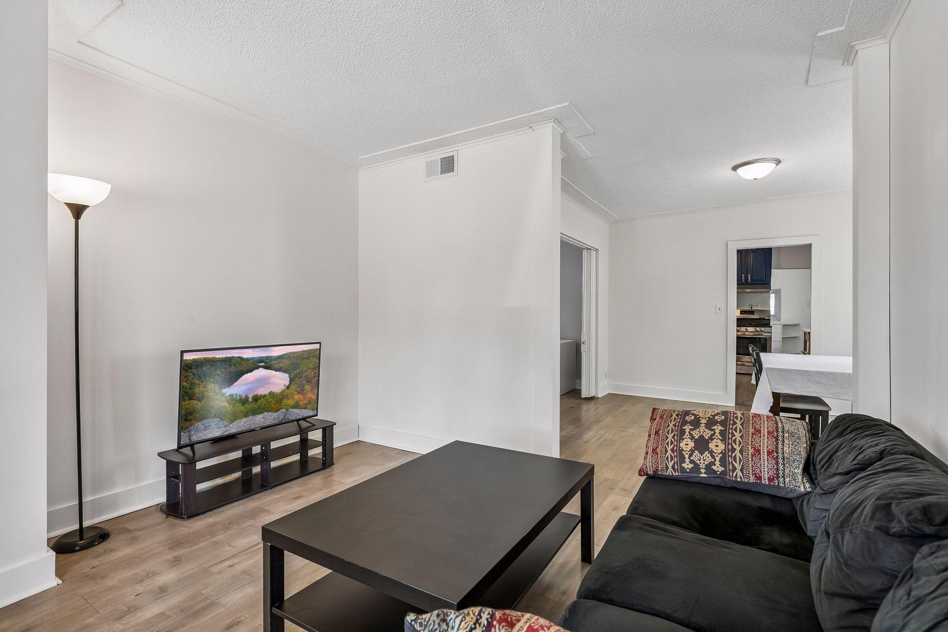 Easy, flowing floor plan from living room to dining room and adjacent office space.