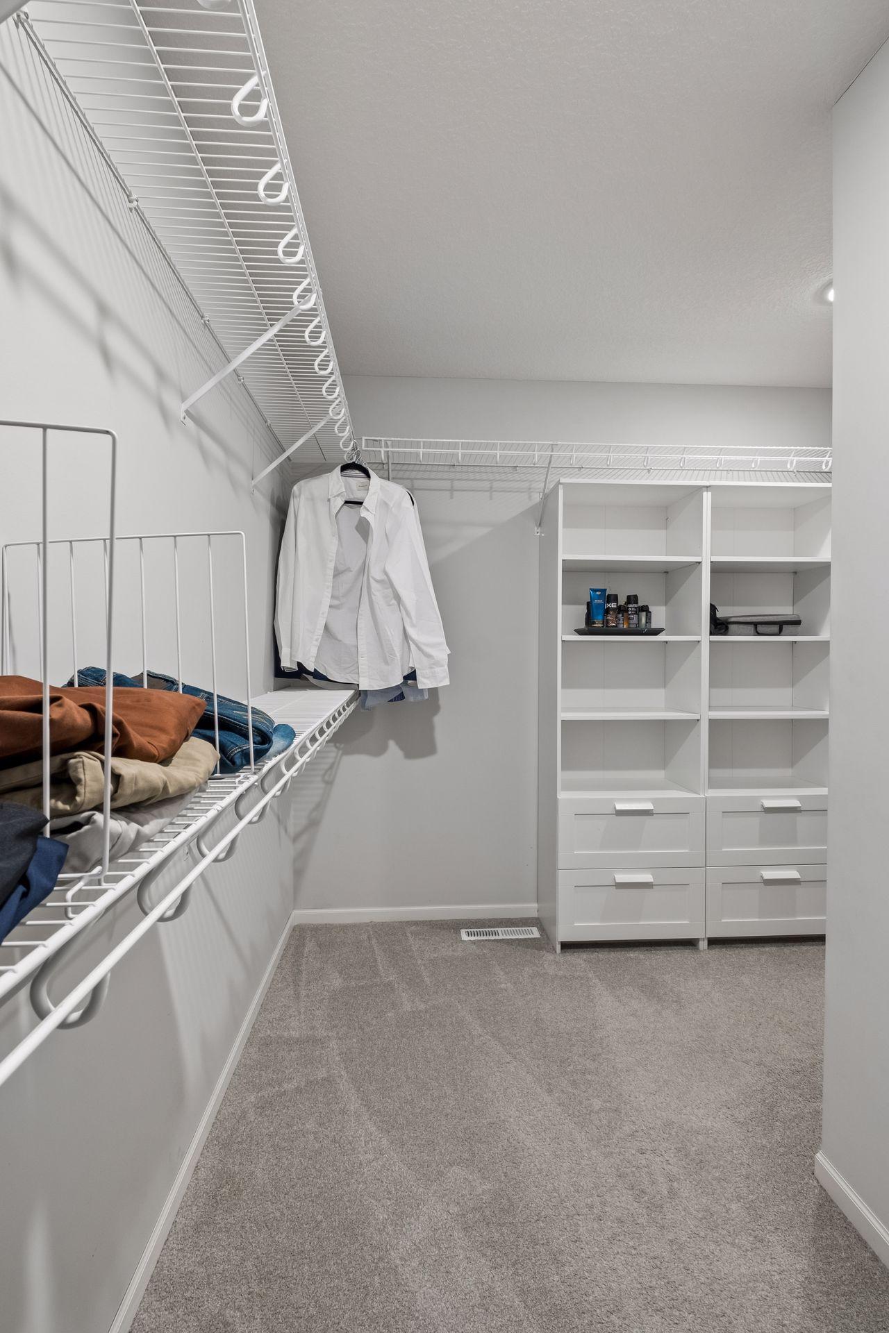 L-Shaped Walk-in Primary Closet