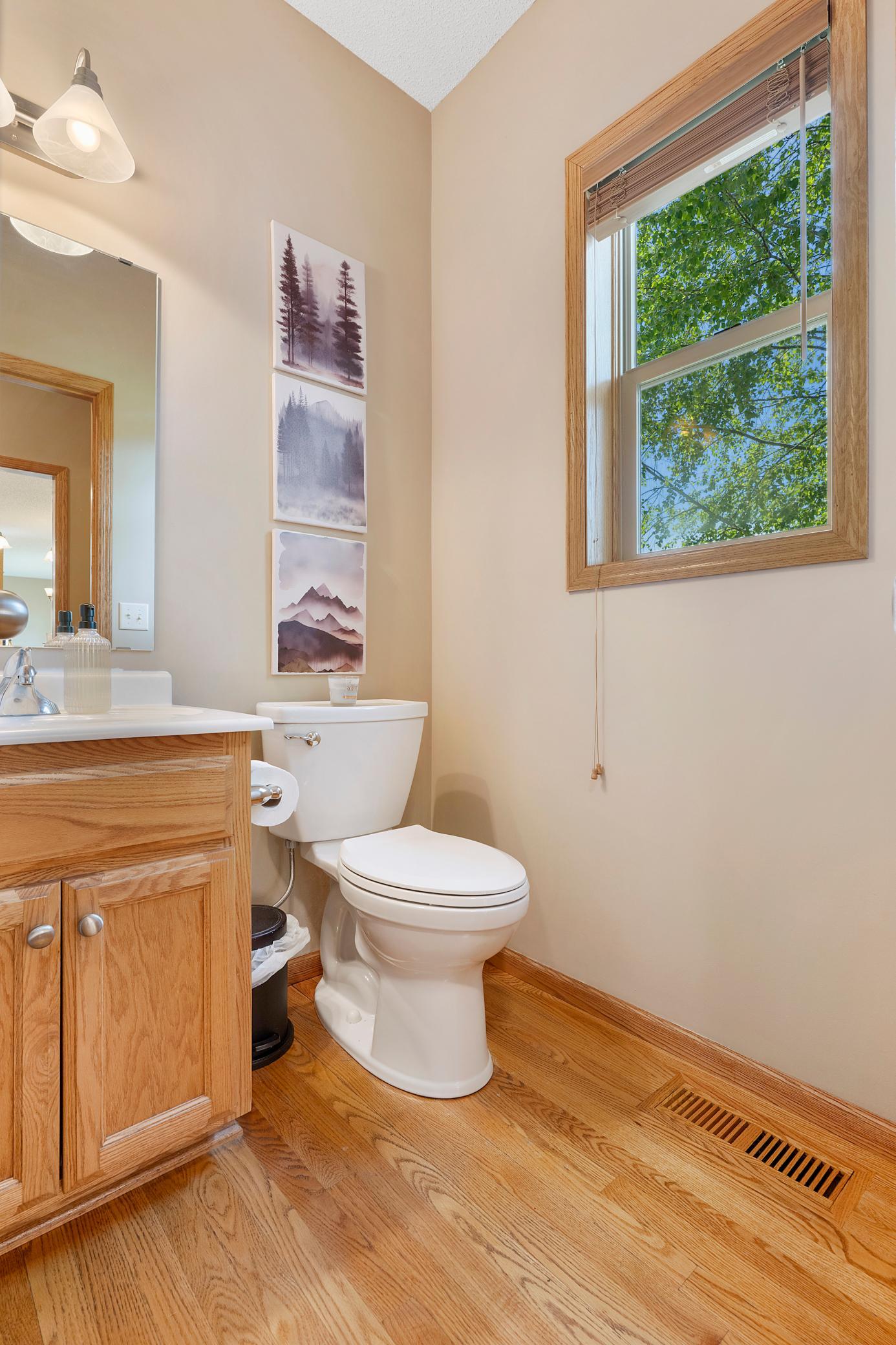 Main level bathroom next to kitchen