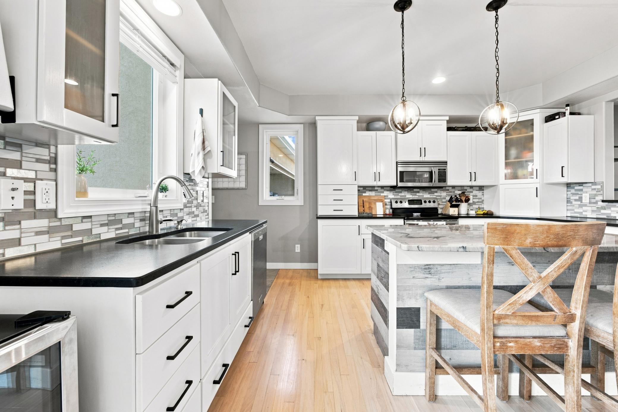 Kitchen with trey ceiling and center island