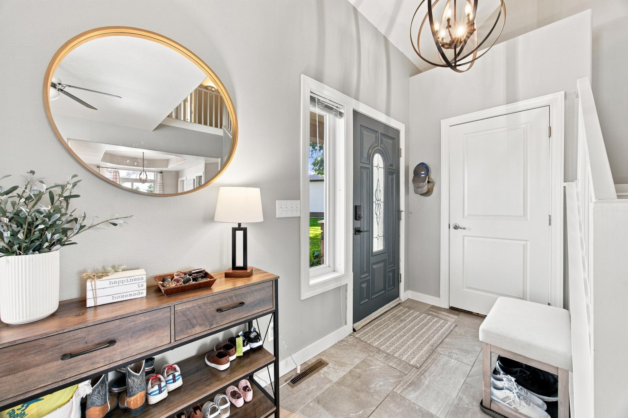 Welcoming front foyer with tile floors!