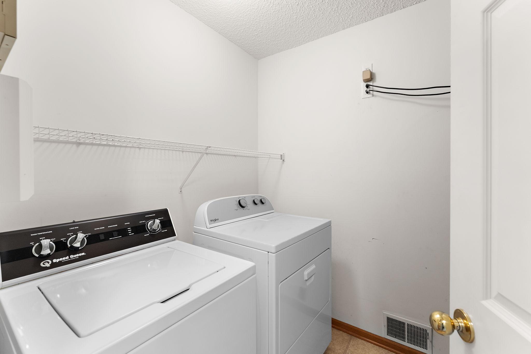 Upper level laundry.