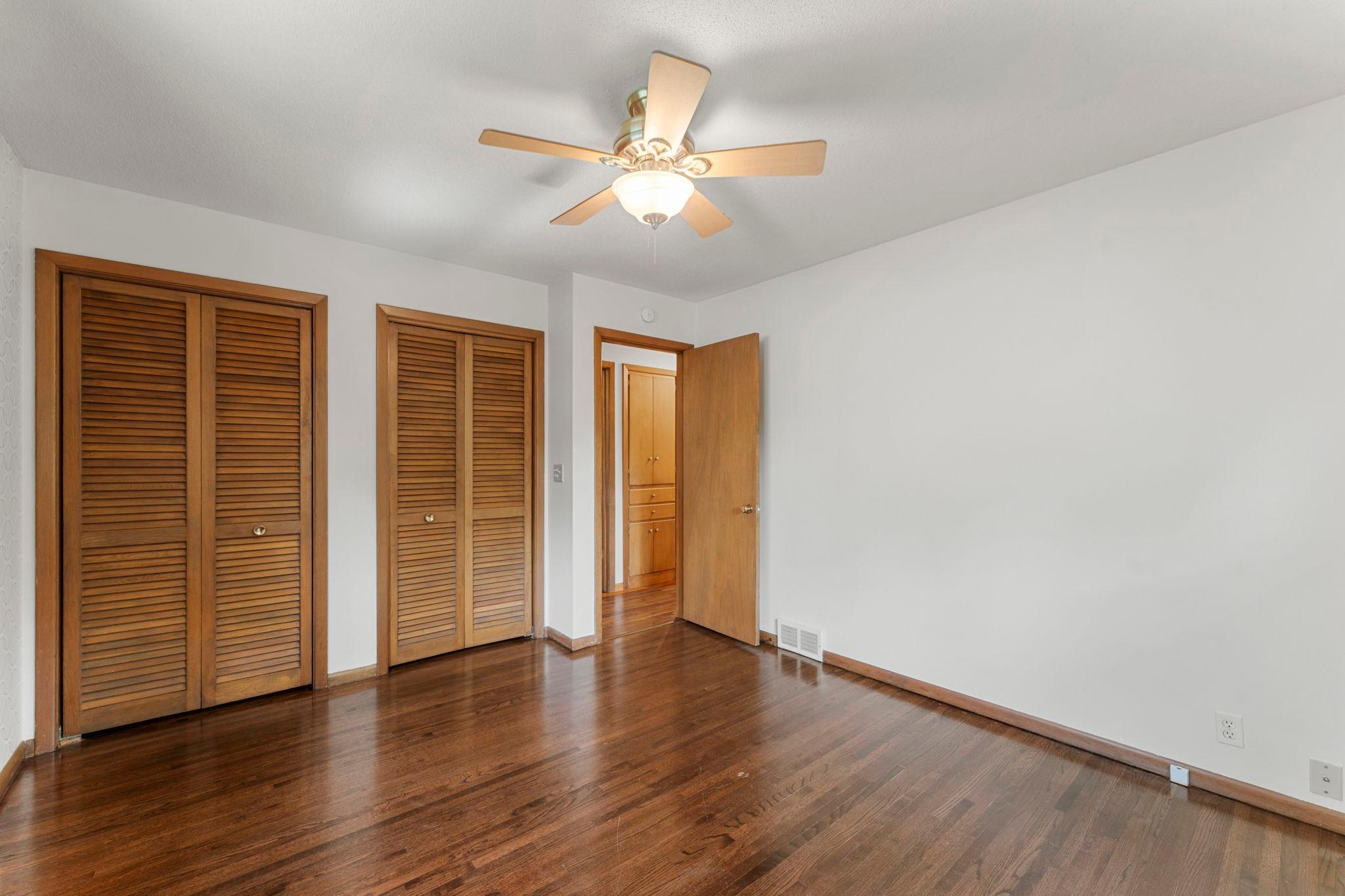 The primary bedroom offers additional closet space for easy organization.
