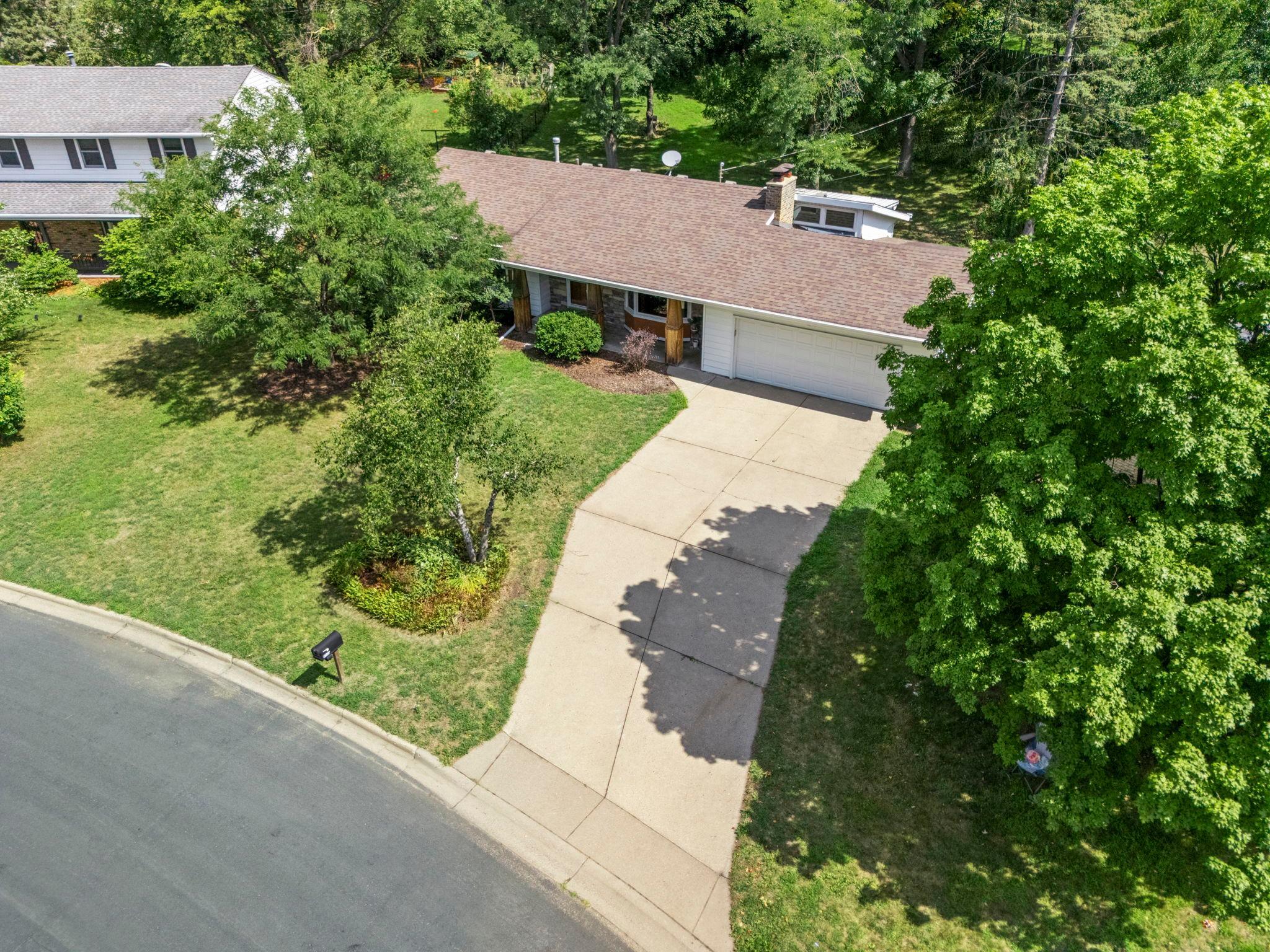 The 2-car garage adds even more versatility with workshop space and a rear garage door for projects, hobbies, or toy storage.