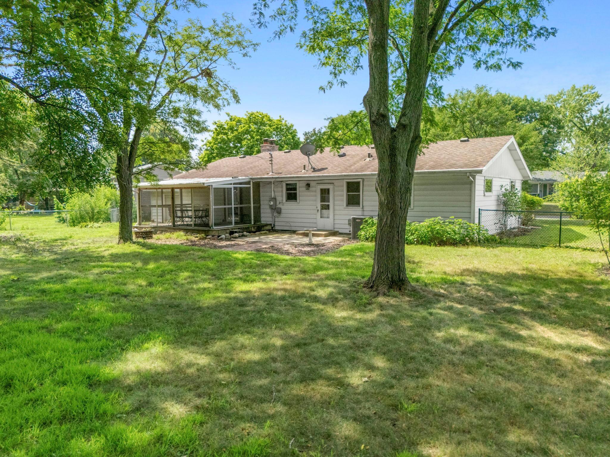 The home backs to a private, wooded .46-acre lot, creating a peaceful oasis with plenty of room to enjoy the outdoors.
