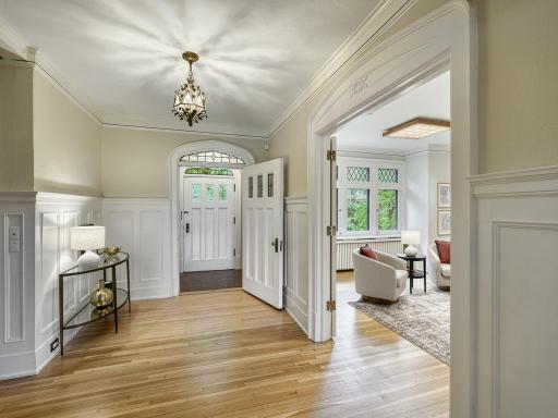 8 - Foyer. Classy solid wood paneled doors.