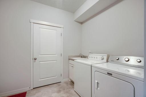 Spacious laundry/mud room right off the garage.