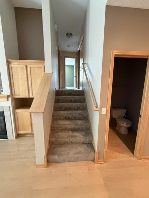 Stairs lead to two bedroom, two baths and laundry area