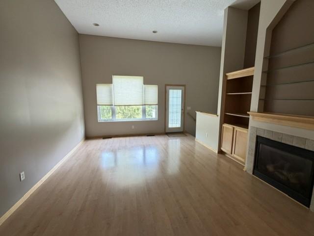 Wall of windows face east for a bright sunny room